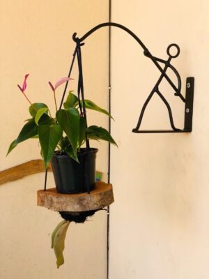 Artisanal Iron Fisherman Silhouette Wall Bracket with Wood Slice Planter